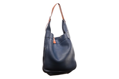 Lot 1 - Hermès - a Marwari PM hobo bag in navy blue...
