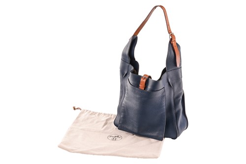 Lot 1 - Hermès - a Marwari PM hobo bag in navy blue...