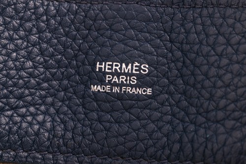 Lot 1 - Hermès - a Marwari PM hobo bag in navy blue...