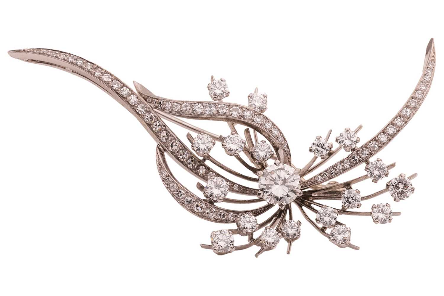 Lot 34 - A diamond set spray brooch; featuring a...