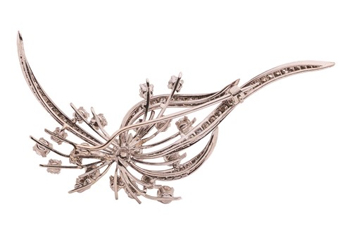 Lot 34 - A diamond set spray brooch; featuring a...