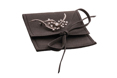 Lot 34 - A diamond set spray brooch; featuring a...
