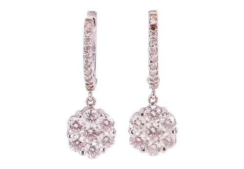 Lot 104 - A pair of diamond-set floral hoop earrings;...