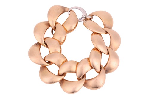 Lot A wide curb link bracelet, comprising a series...