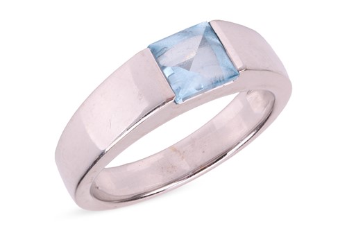 Lot A topaz dress ring, comprising a square sky...