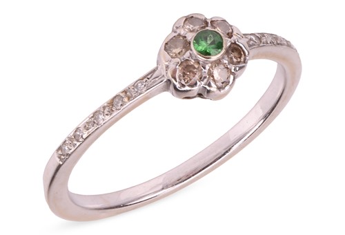 Lot A gem-set daisy ring, composed of a central...