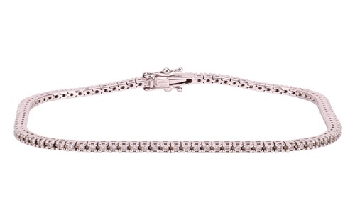 Lot A diamond-set tennis bracelet, claw-set with...