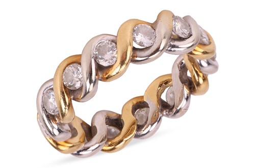 Lot A diamond-set full eternity ring, of twisted...