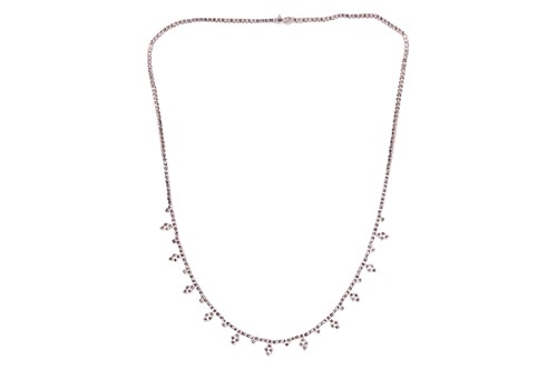 Lot A diamond-set fringe necklace, composed of...