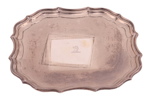 Lot 257 - A silver waiter, of square shape with piecrust...
