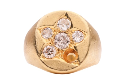 Lot A diamond-set signet ring The oval plaque...