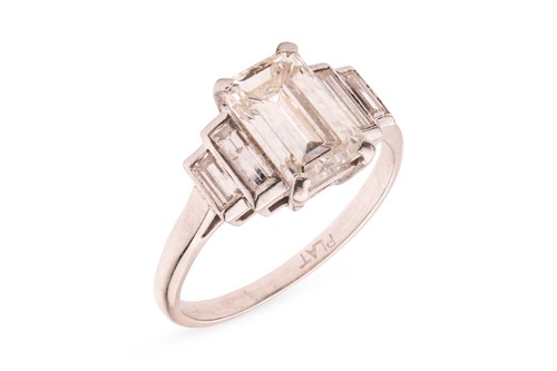 Lot 28 - An Art Deco diamond dress ring, with an...