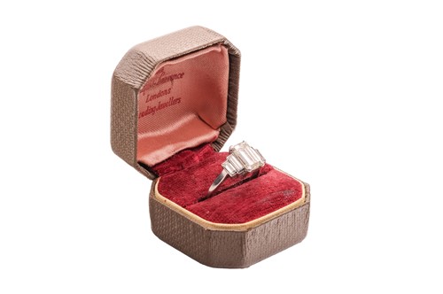 Lot 28 - An Art Deco diamond dress ring, with an...