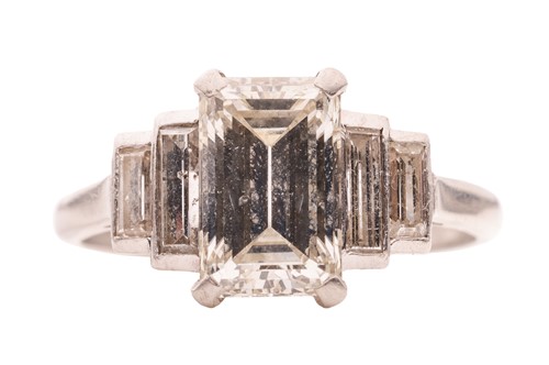 Lot 28 - An Art Deco diamond dress ring, with an...