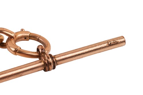 Lot A pencil fob and chain; the reeded...