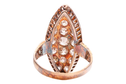Lot 8 - A diamond set dress ring; the navette-shaped...
