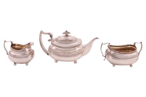 Lot 263 - A George III silver three-piece tea service,...