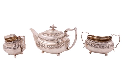 Lot 263 - A George III silver three-piece tea service,...