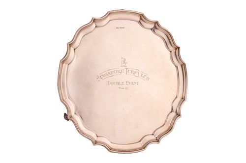 Lot 265 - A presentation silver salver, by Harrions...