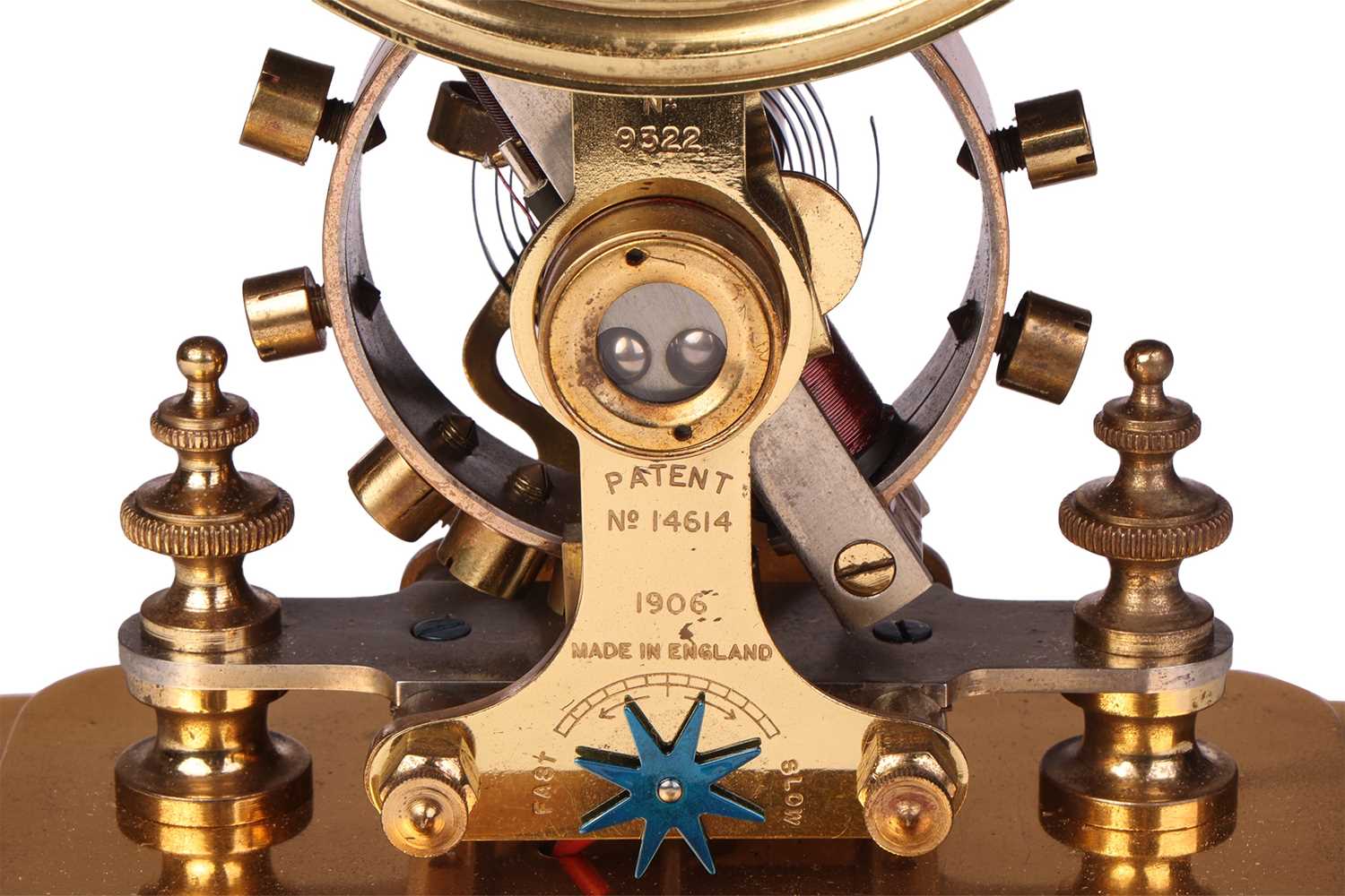 Lot 110 - A 1906 electro-magnetic brass mantel clock,