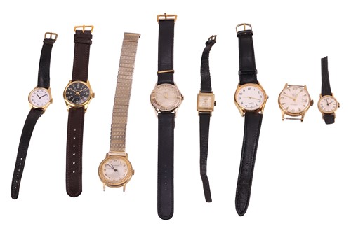 Lot 54 - A group of eight gold-plated watches; to...