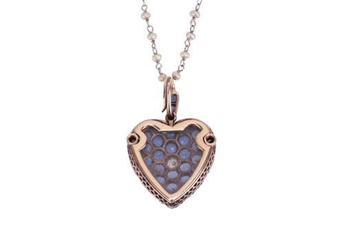 Lot 25 - A heart locket pendant on chain set with...