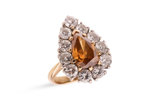 Lot A fancy deep brownish-yellow diamond cluster...