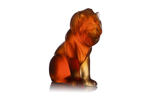 Lot A Lalique 'Bamara' Lion, in amber glass, the...