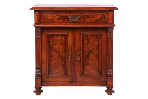 Lot 40 - An early 20th-century two-door cabinet, with...