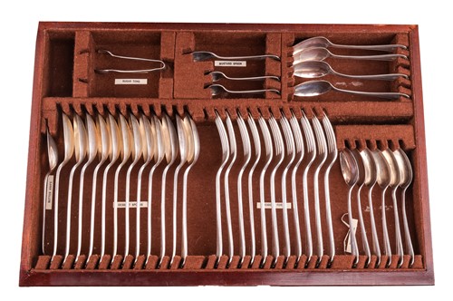 Lot 293 - A two-drawer canteen containing a composite...