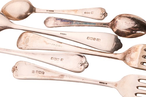 Lot 293 - A two-drawer canteen containing a composite...