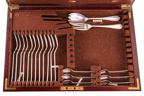 Lot 293 - A two-drawer canteen containing a composite...