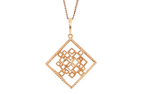 Lot 102 - An abstract openwork pendant, of geometrical...