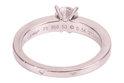 Lot Cartier - A diamond solitaire ring, set with a...