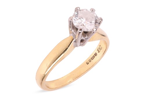 Lot 139 - A diamond solitaire ring in 18ct gold,...