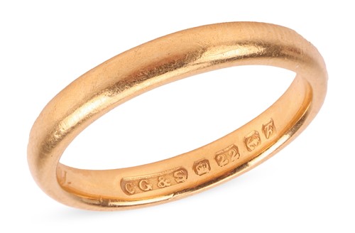 Lot 167 - A wedding band in 22ct gold, with a polished...