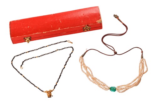Lot 141 - Two Indian necklaces; the first featuring a...