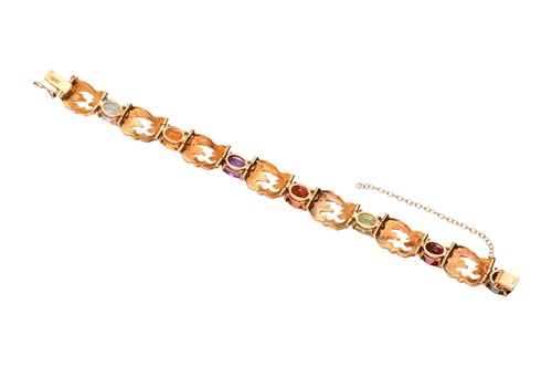 Lot A Modernist gem-set bracelet in 18ct gold,...