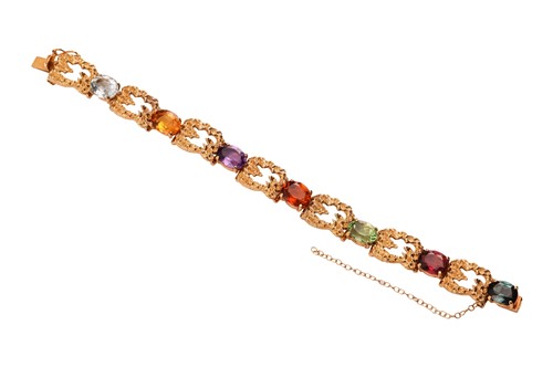 Lot A Modernist gem-set bracelet in 18ct gold,...