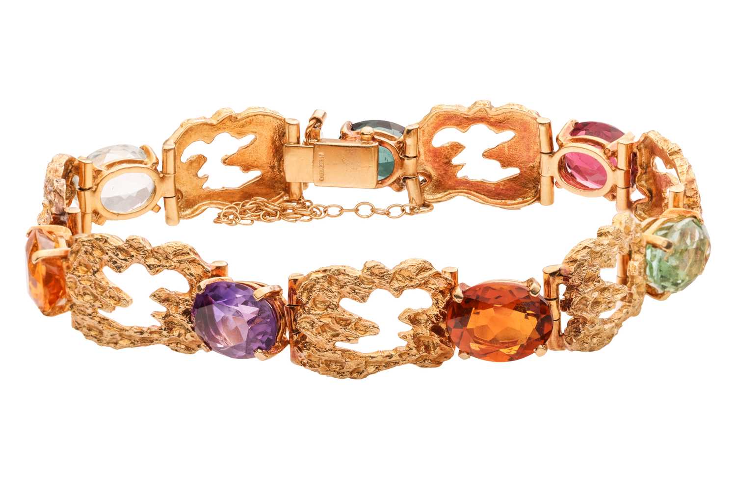 Lot A Modernist gem-set bracelet in 18ct gold,...