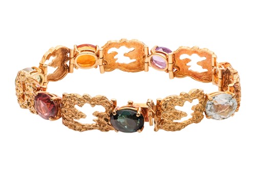 Lot A Modernist gem-set bracelet in 18ct gold,...
