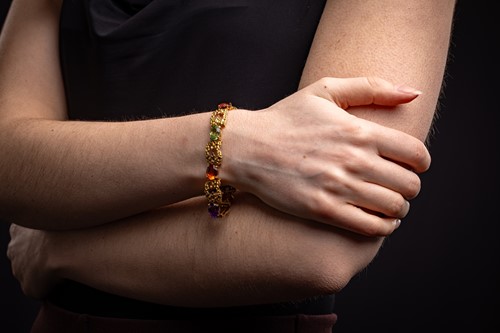 Lot A Modernist gem-set bracelet in 18ct gold,...
