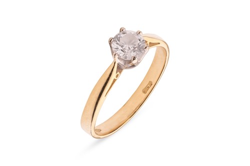 Lot 252 - A diamond solitaire ring in 18ct gold, the...