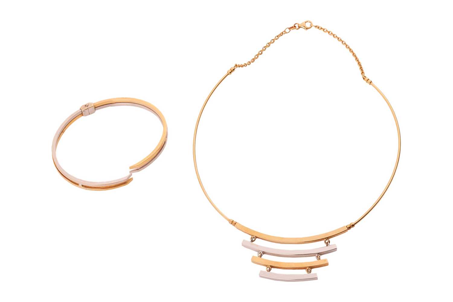 Lot 209 - A necklace and bangle suite, each of...
