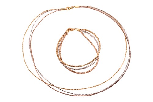 Lot 213 - A three-toned braided link necklace and...