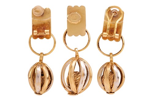 Lot 211 - A two-toned drop pendant and earrings set; of...