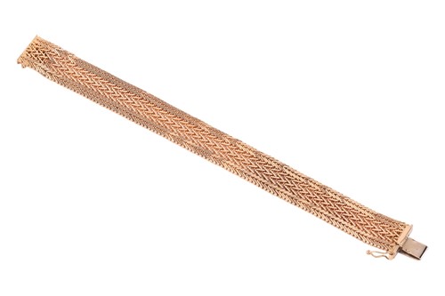 Lot 96 - A mesh bracelet, comprising chevron links...