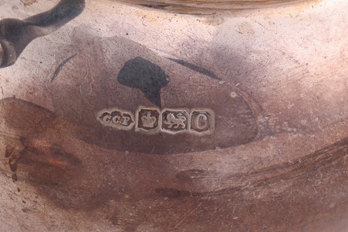 Lot 264 - A George V four-piece silver tea set,...