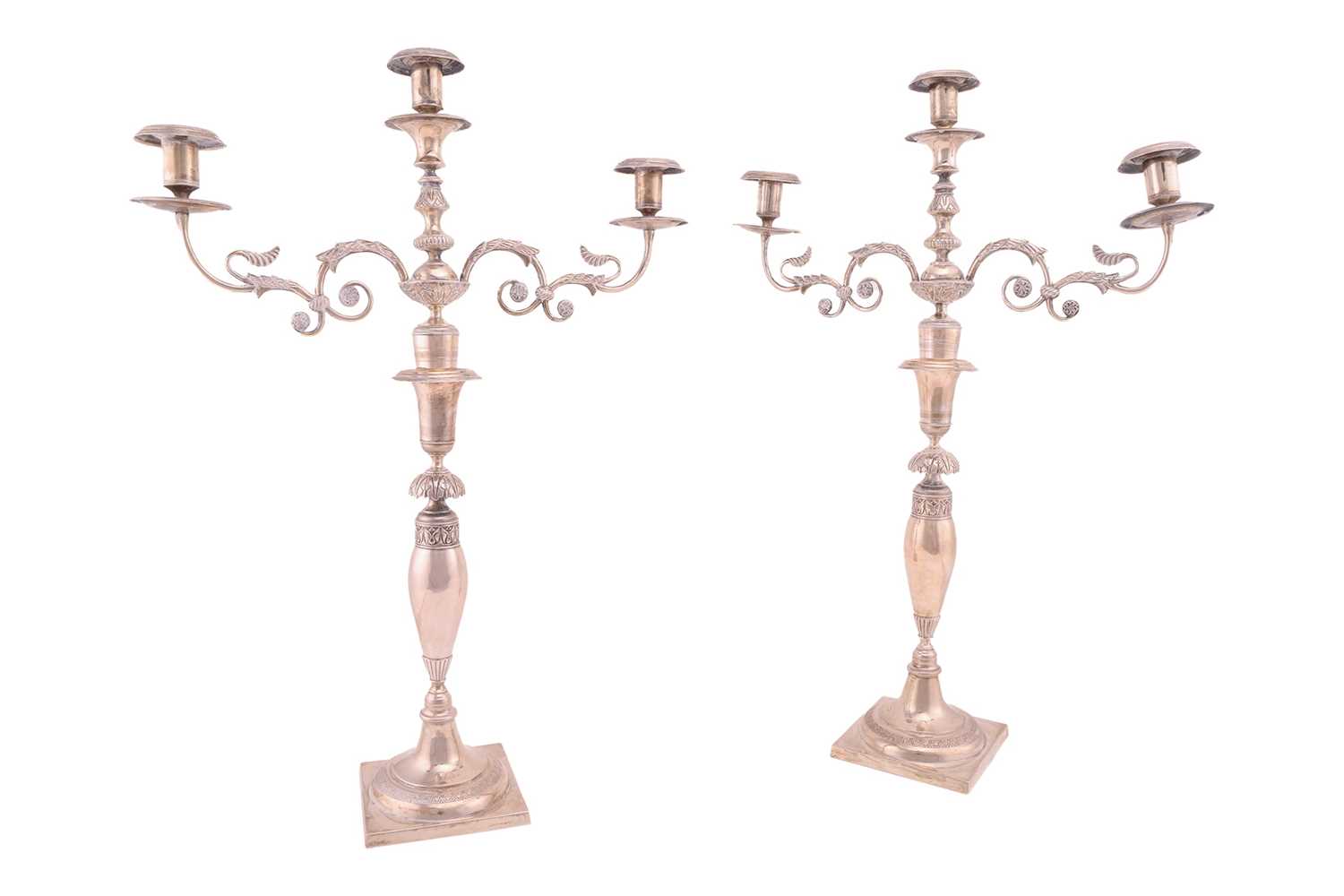 Lot A pair of German three-light candelabra, by...