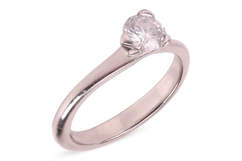 Lot 284 - A diamond solitaire ring, featuring a round...